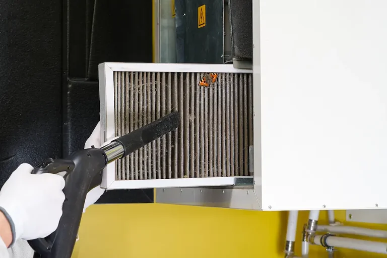 Man replacing air filter